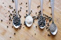 Various types of pepper on a wooden background Royalty Free Stock Photo