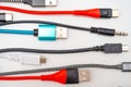 USB and smartphone cables and connectors of various types and colours. Royalty Free Stock Photo