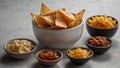 Various Types of Salty Beer Snacks in Bowls on a Grey Surface Royalty Free Stock Photo