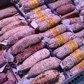 Various types of sausages and salami, fridge in the shop filled with sausages, salami and salsiccia, Italian sausage shop, Italian