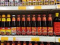 Various types of soy sauce used as a cooking ingredient are on sale at supermarkets.