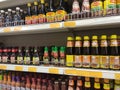 Various types of soy sauce used as a cooking ingredient are on sale at supermarkets.