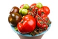Various types of tomatoes in a bowl on the table Royalty Free Stock Photo