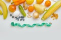 Various useful food items on white background. Diet opposition concept, close-up top view