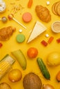 Various useful and unhealthy foods on a bright yellow background