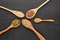 Different kinds of nuts and seeds on black slate background. Top view. Healthy food. Vegetarian nutrition Royalty Free Stock Photo