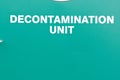 Decontamination unit signage on side of a unit