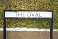 The oval street sign