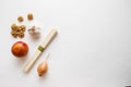 Various vegetables isolated on white background. Healthy food composition with noodles, garlic, orange, onion, walnut for pasta Royalty Free Stock Photo