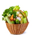 Various vegetables in a wicker basket isolate on white background Royalty Free Stock Photo