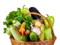 Various vegetables in a wicker basket isolate on white background Royalty Free Stock Photo