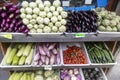 ucchini, eggplant, tomato, chinese cabbage on the counter for sale in the market Royalty Free Stock Photo