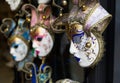 Various Venetian Masks Hanging Outside a Shop