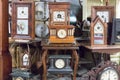 Various vintage clocks in thrift store