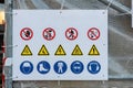 Various warning, prohibition and information signs at the construction site - image