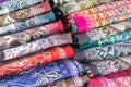 various weaving techniques, close up of colorful printed rolls o Royalty Free Stock Photo