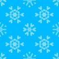 Various white crochet snowflakes on blue background. Royalty Free Stock Photo