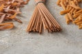 Various wholegrain pasta, tagliatelle, spaghetti and penne rigate, healthy noodle alternative with more fiber, gray stone