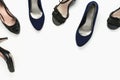 Various women high-heels shoes on white background, fashion or shopping concept