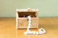 Various womens beautiful jewelry in a wicker box