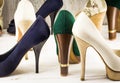 Various womens shoes on wooden background