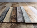 Various wooden texture laminate flooring samples arranged on a wooden surface showcasing different colors and grain patterns for Royalty Free Stock Photo