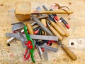 Various woodworking hand tools on workbench