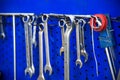 Various spanners are hanging on the stand Royalty Free Stock Photo