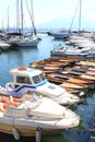 Various yachts in marina moored on sea or ocean in summer in good weather