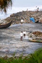 Fishing net with many fishermen on backside. Odayam beach, Varkala, India
