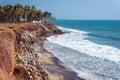 Varkala, Kerala, India. Steep coast, palm trees and sea horizon Royalty Free Stock Photo