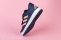 Varna , Bulgaria - AUGUST 13, 2019 : ADIDAS ALTA SPORT shoe, on pink background. Product shot. Adidas is a German corporation