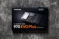 Samsung NVMe SSD 970 EVO Plus box on a dark background. Small and fast solid state drive. Modern desktop pc hardware components