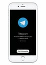 Telegram messenger launch screen with Telegram logo on white Apple iPhone 8 display