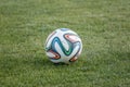 Varna, BULGARIA - MAY 30, 2015: Close-up official FIFA 2014 World Cup ball (Brazuca) on the grass. Adidas, a major German company Royalty Free Stock Photo