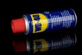 VARNA, BULGARIA - MAY 19, 2022: WD-40 on black background. Multi use product protects metal from rust and corrosion