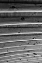 Wooden beams resembling ribs supporting a timber roof in shades of grey. Royalty Free Stock Photo