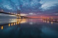 Vasco da Gama bridge over tagus river and pier in Lisbon at dawn Royalty Free Stock Photo