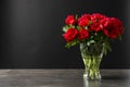 Vase with beautiful blooming peonies on table Royalty Free Stock Photo