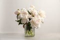 Vase with beautiful blooming peonies on table Royalty Free Stock Photo