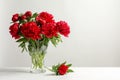 Vase with beautiful blooming peonies on table Royalty Free Stock Photo