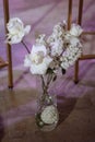 Vase with beautiful roses on the floor Royalty Free Stock Photo