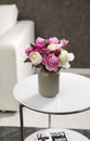 Vase with bouquet of beautiful peonies on table Royalty Free Stock Photo