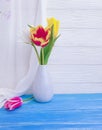 Vase bouquet of tulips decor home colorful romantic elegance on wooden background Royalty Free Stock Photo