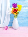 Vase bouquet of tulips decor vintage springtime colorful romantic elegance on wooden background Royalty Free Stock Photo