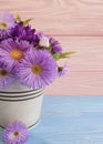 Vase of chrysanthemum flower, blooming arrangement pot bell on wooden background