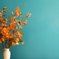 a vase filled with orange flowers sitting on a table