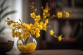 A vase filled with yellow Apricot blossom at the table. Lunar new year decoration