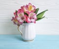 Vase flower spring leaf alstroemeria elegance seasonal on a wooden arrangement Royalty Free Stock Photo