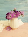 Vase flowers bell, purple elegance beauty decorative spring chrysanthemum arrangement on a wooden background